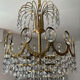 Brass chandelier with crystal pendants from the 1970s.