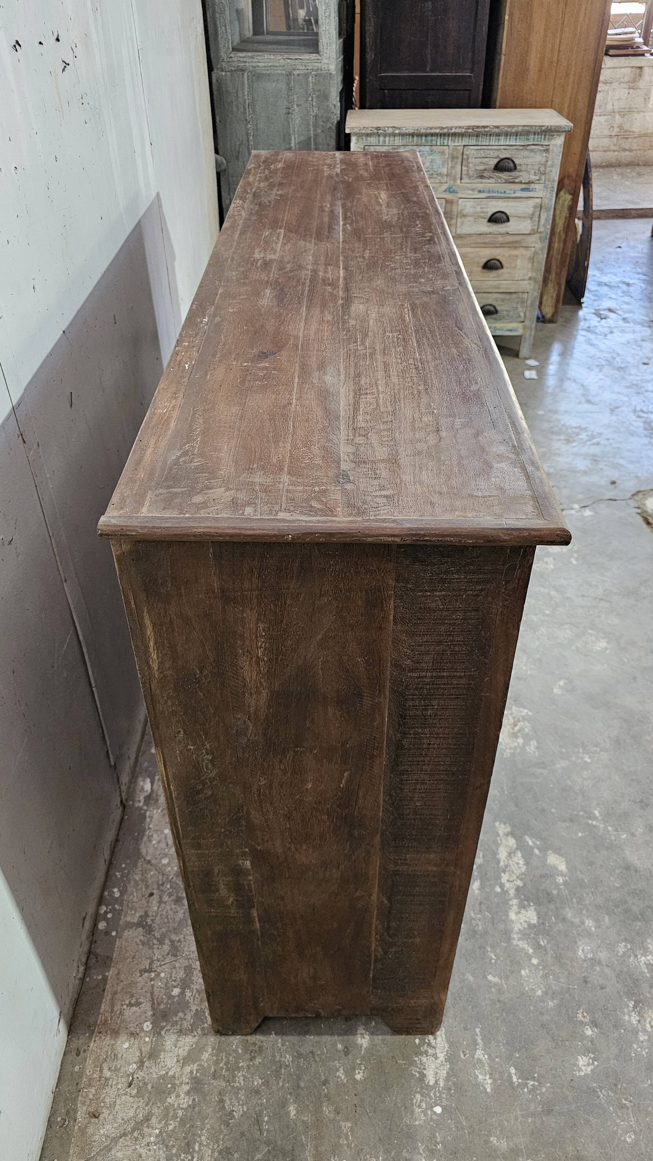 Antique glass-fronted buffet in Burmese teak
