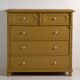Large antique mustard-colored chest of drawers (circa 1920)
