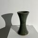Dark green handcrafted vase with glazed ceramic grass blades