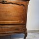 Louis XV style oak TV cabinet with drop-down flap.