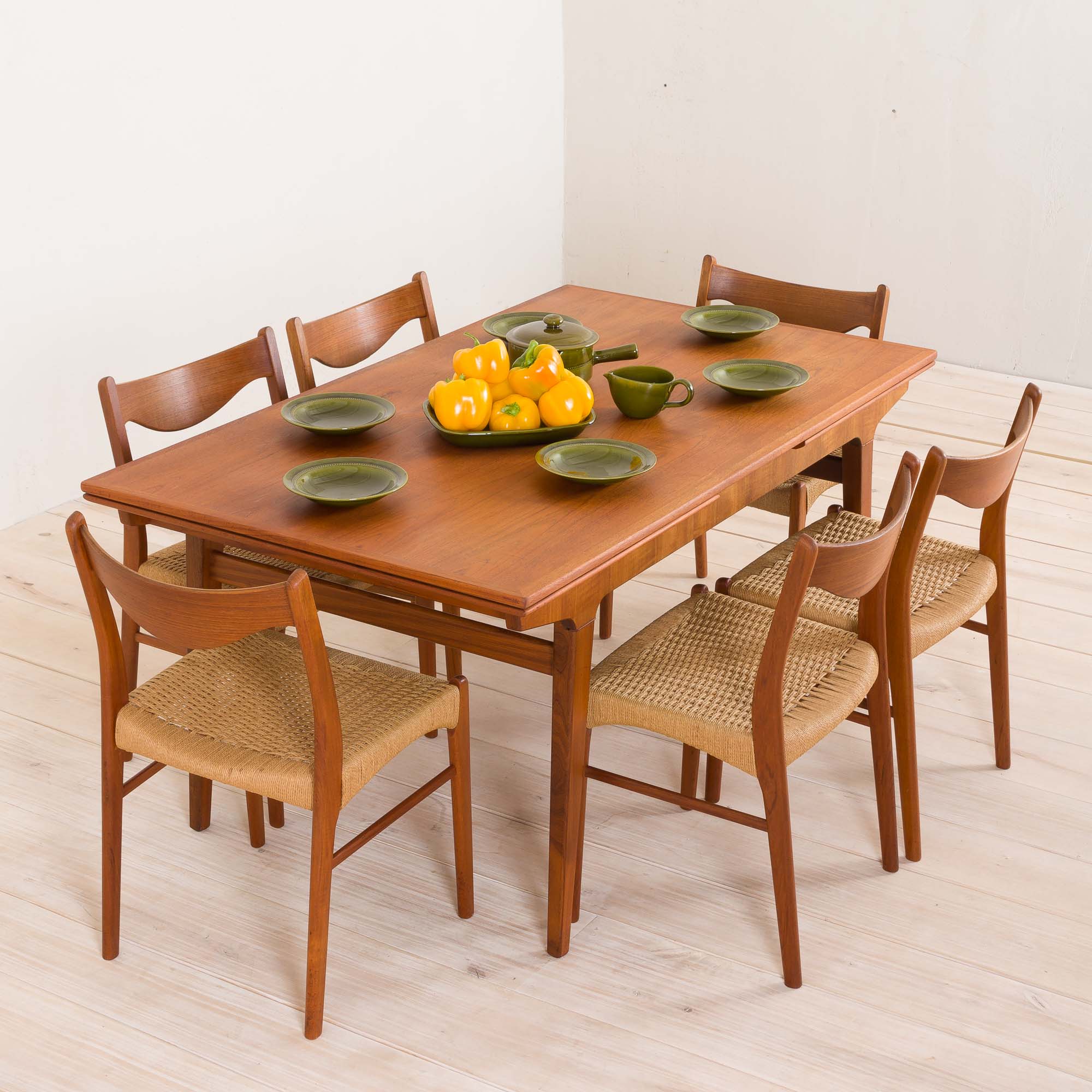 Teak extension dining table with concealed panels, Denmark, 60s