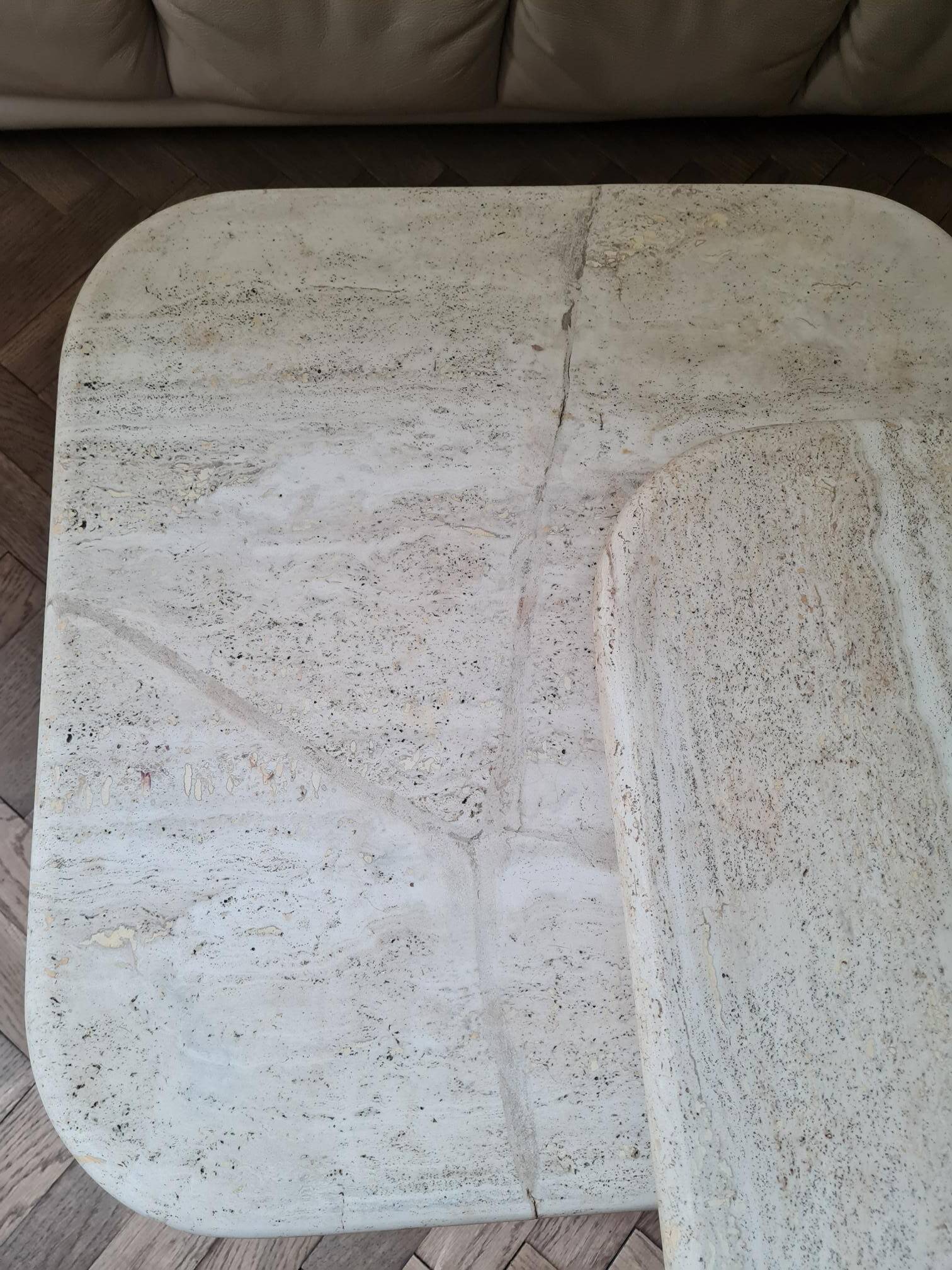 Pair of travertine nesting tables
