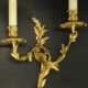 Large pair of stamped wall sconces in Louis XV style - gilded bronze