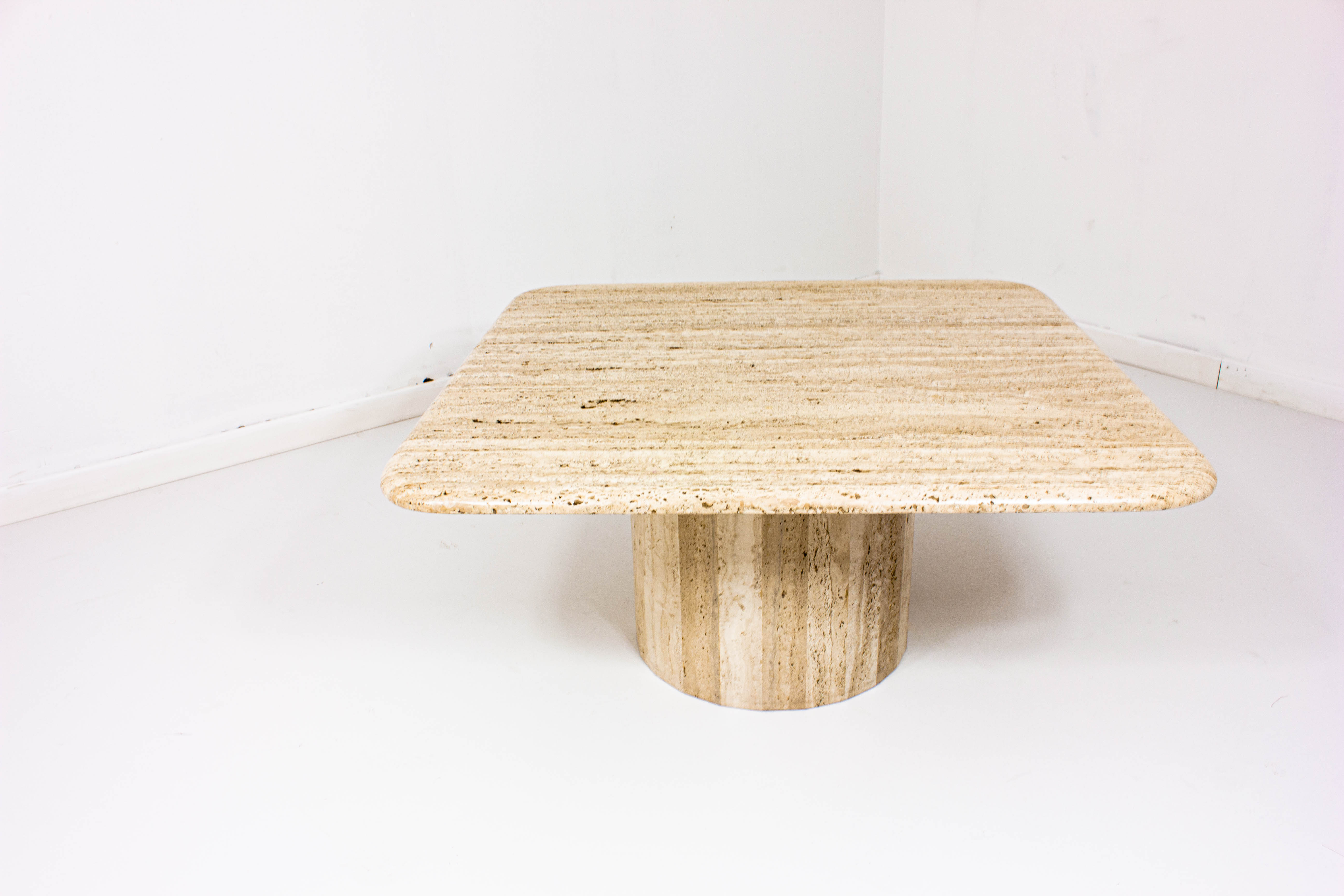 Square travertine coffee table