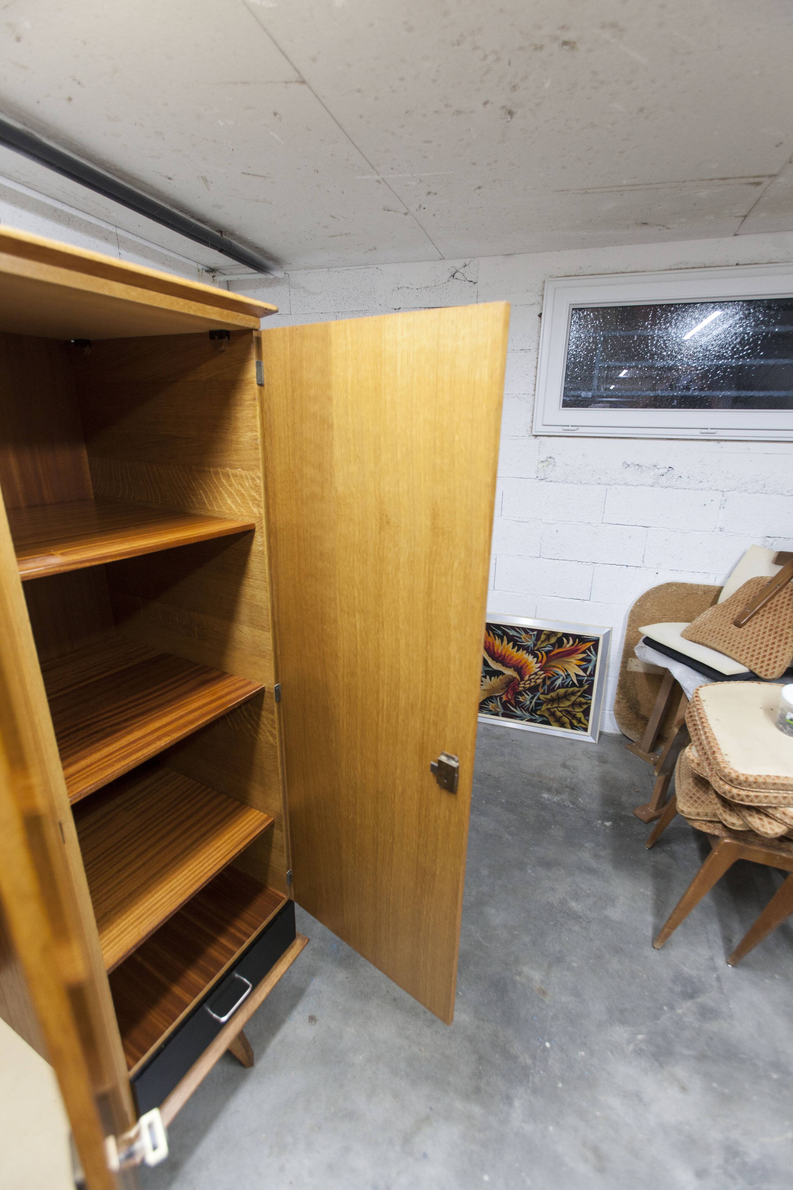 French wardrobe with tapered legs, 3 doors, 1 mirror (27*130), and 1 drawer.