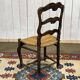 Set of 7 Louis XV style beech chairs with straw seats.