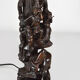 African carved ebony lamp, "Hunters, buffalo and crocodile"