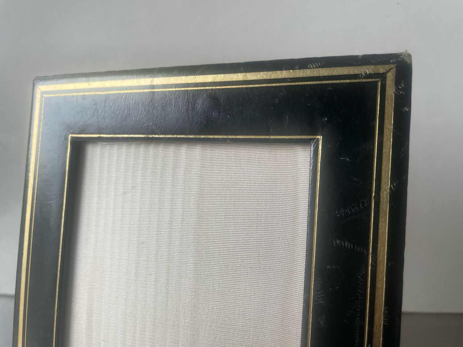 Antique black leather  with gilding frame measurements 19 cm x 15 cm