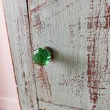 Patinated bedside table end of sofa