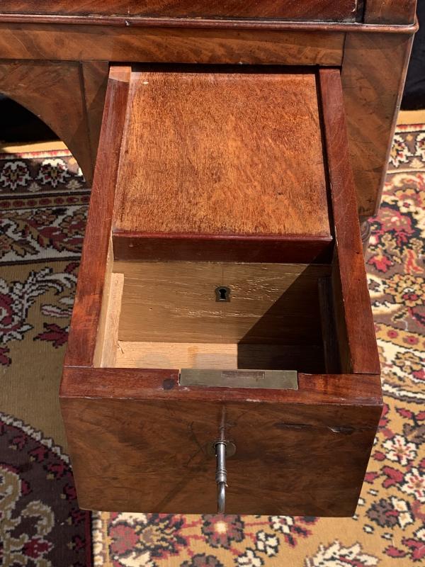 Restoration-era mahogany cylinder desk