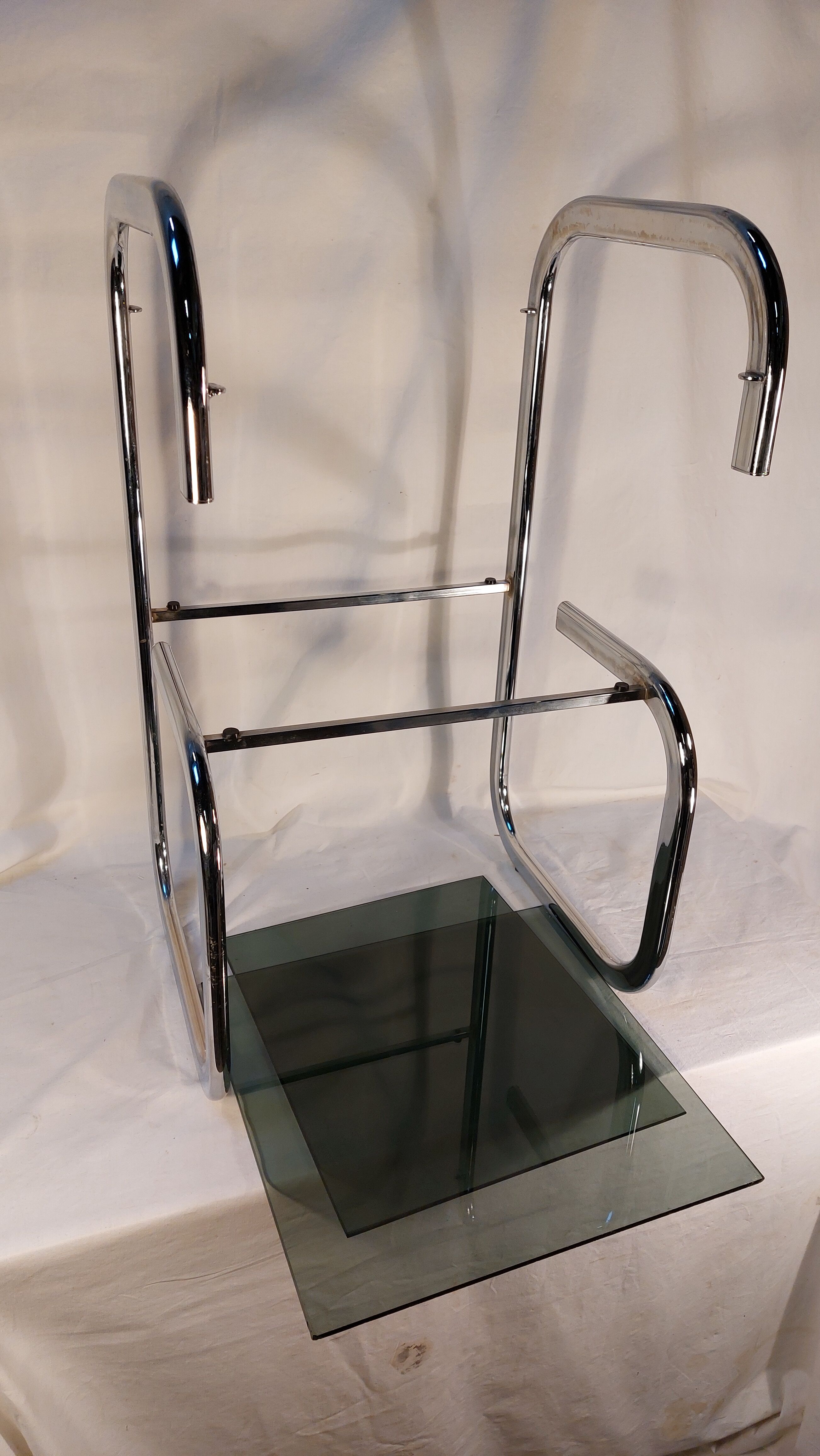Vintage side table in chrome and smoked glass