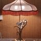 Large gilded brass lamp with white porcelain fleur-de-lis decoration