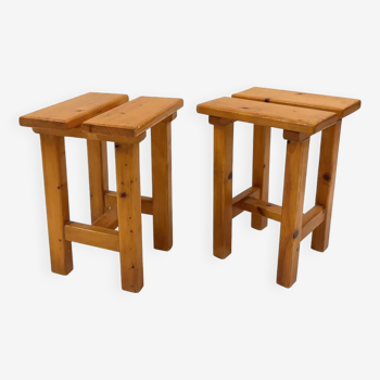 pair of chalet style pine stools