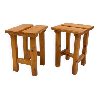 pair of chalet style pine stools