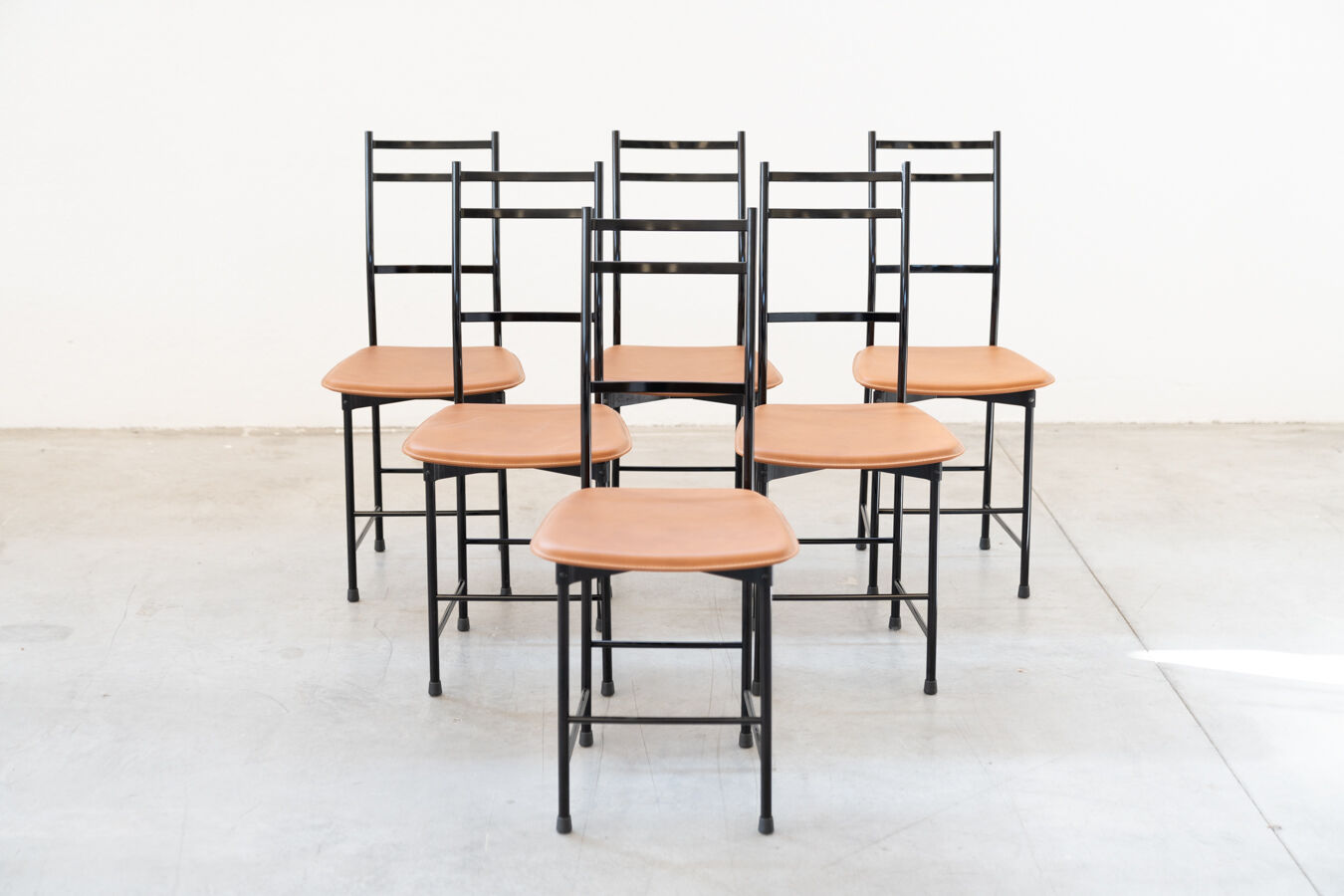 Dining chairs in brown leather and aluminum by ycami, 1980