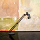 Desk lamp with metal frame and plastic details. Designer C.V.B. 80s
