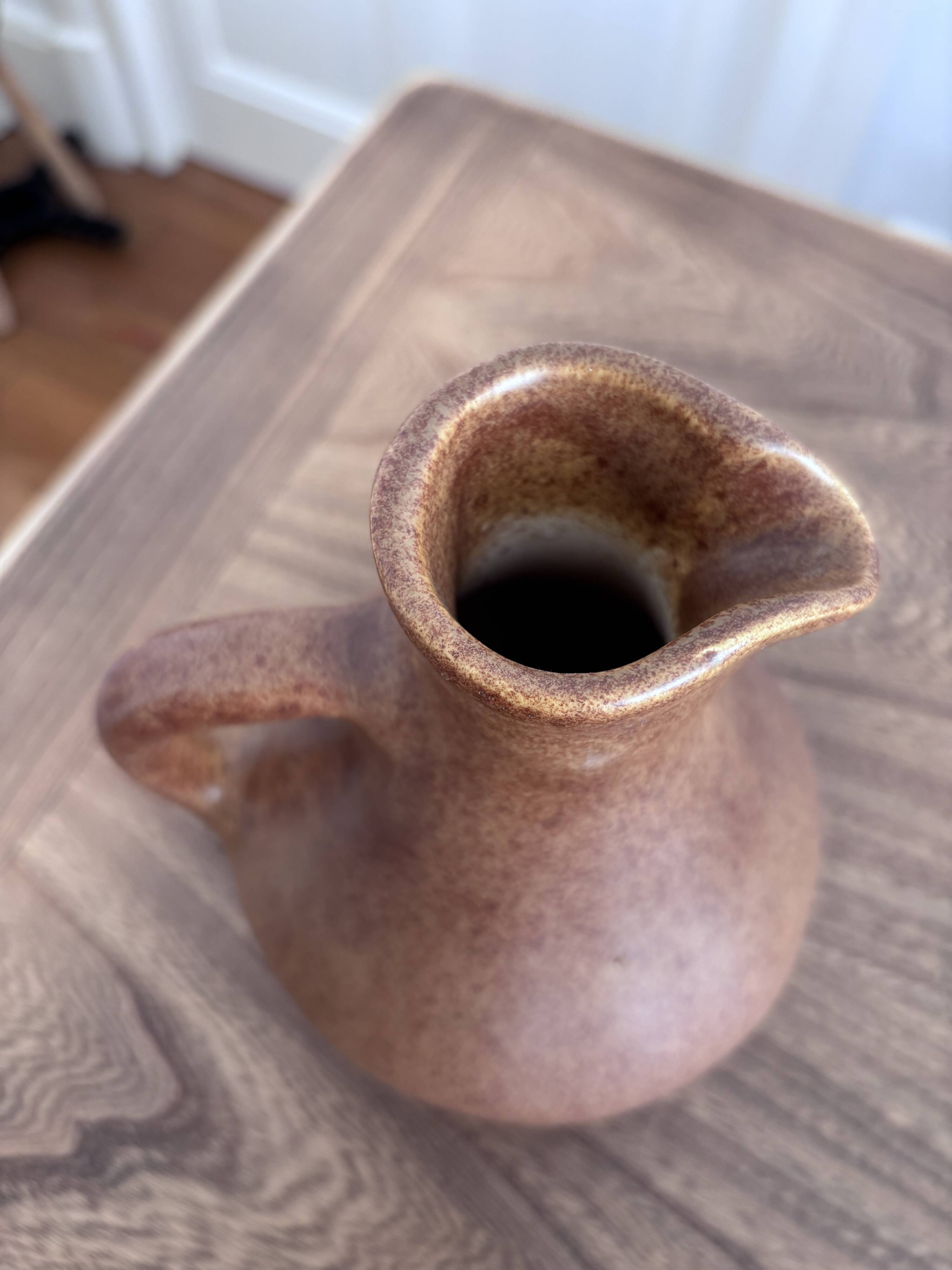 Vintage brown ceramic pitcher signed Max Idlas.
