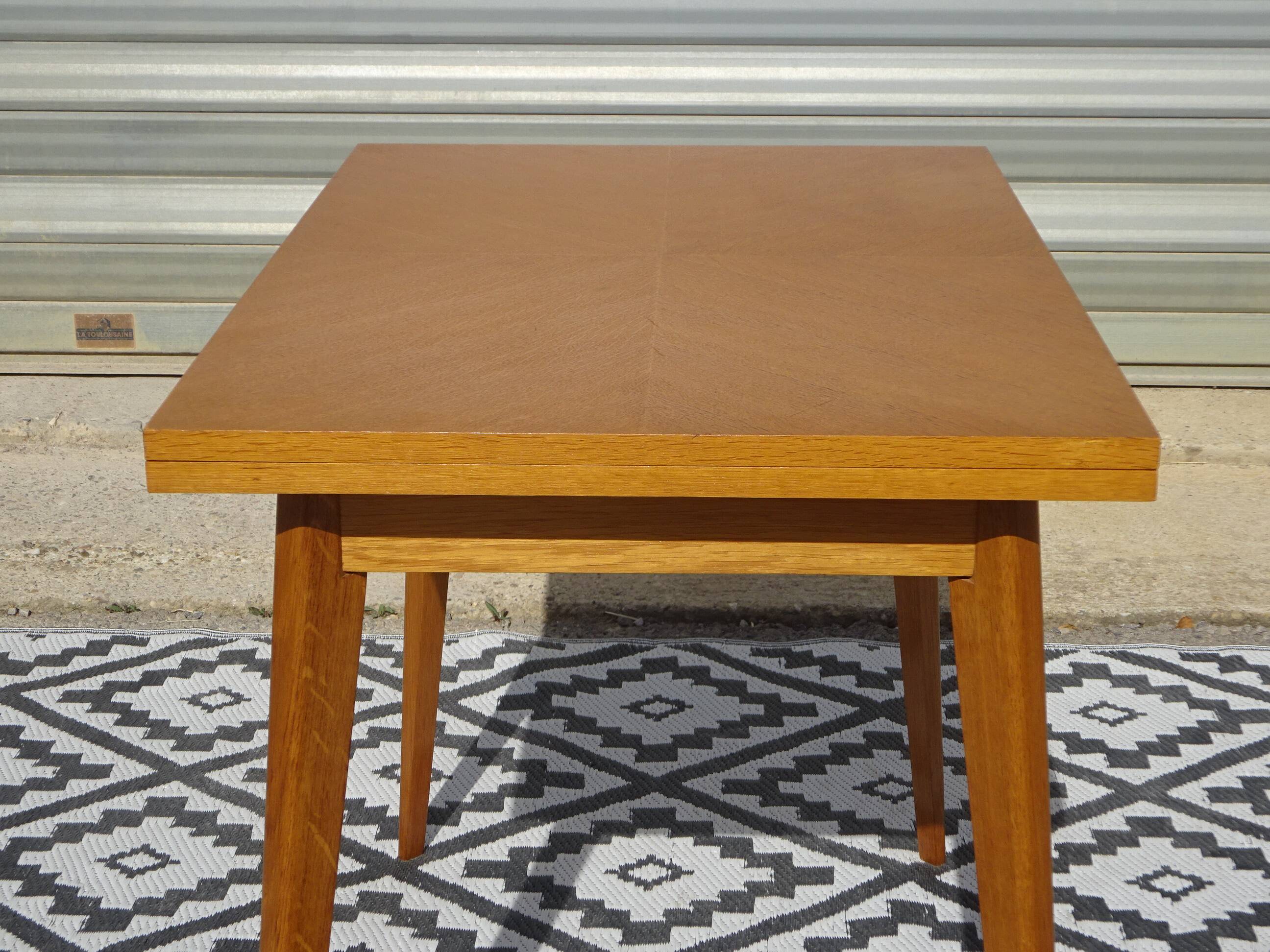 Scandinavian portfolio table model "half-century" by SAM