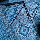Piece of sofa in steel and glass around 1950