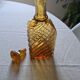 Antique decanter made of amber blown glass