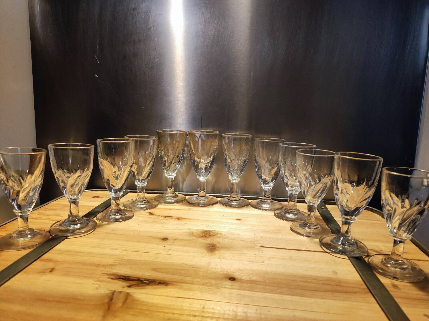12 small twisted bistro glasses, 19th century