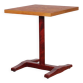 Square wooden dining table with a pedestal from the 1980s.
