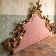 Italian rococo-style headboard in carved gilded wood, 19th century.