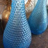 Turquoise blue textured glass carafe