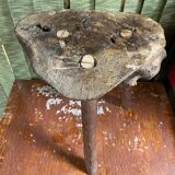 Old brutalist design wooden tripod stool