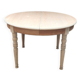 Round table with two raw cherry wood extensions