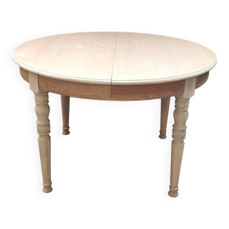 Round table with two raw cherry wood extensions