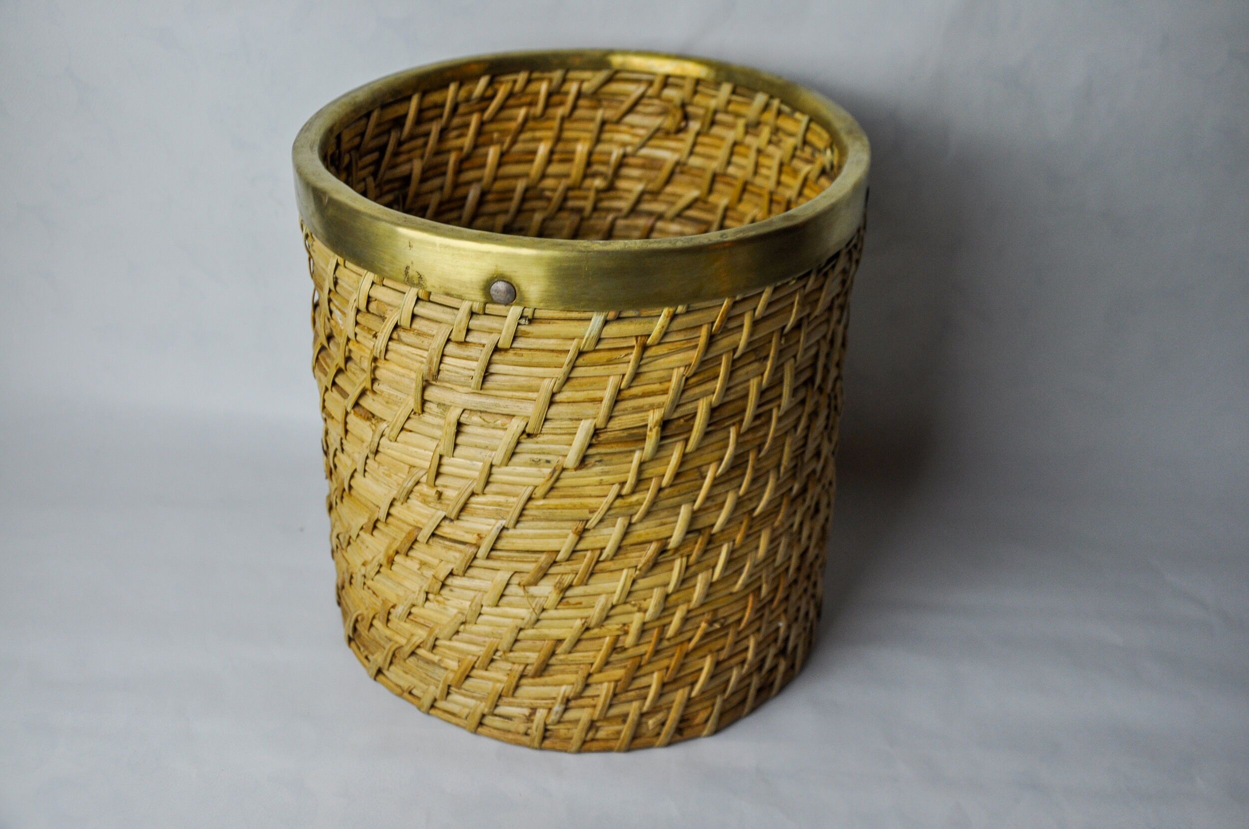 Rattan and brass book basket, Italy, 1970