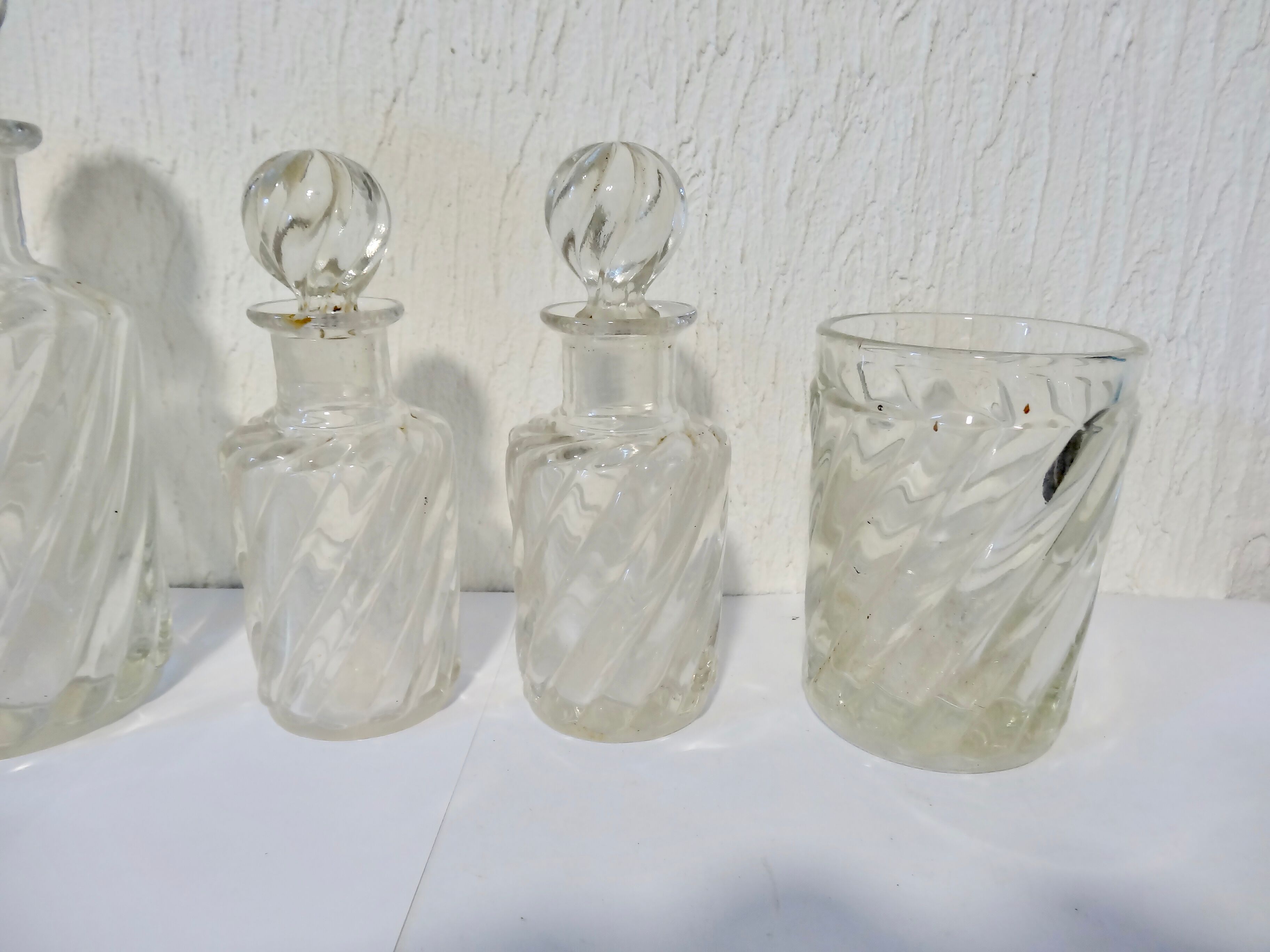 Set of twisted crystal bottles