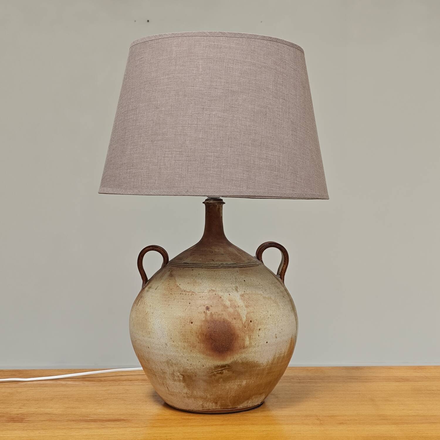 Modernist ceramic sandstone lamp with two handles from the 1950s
