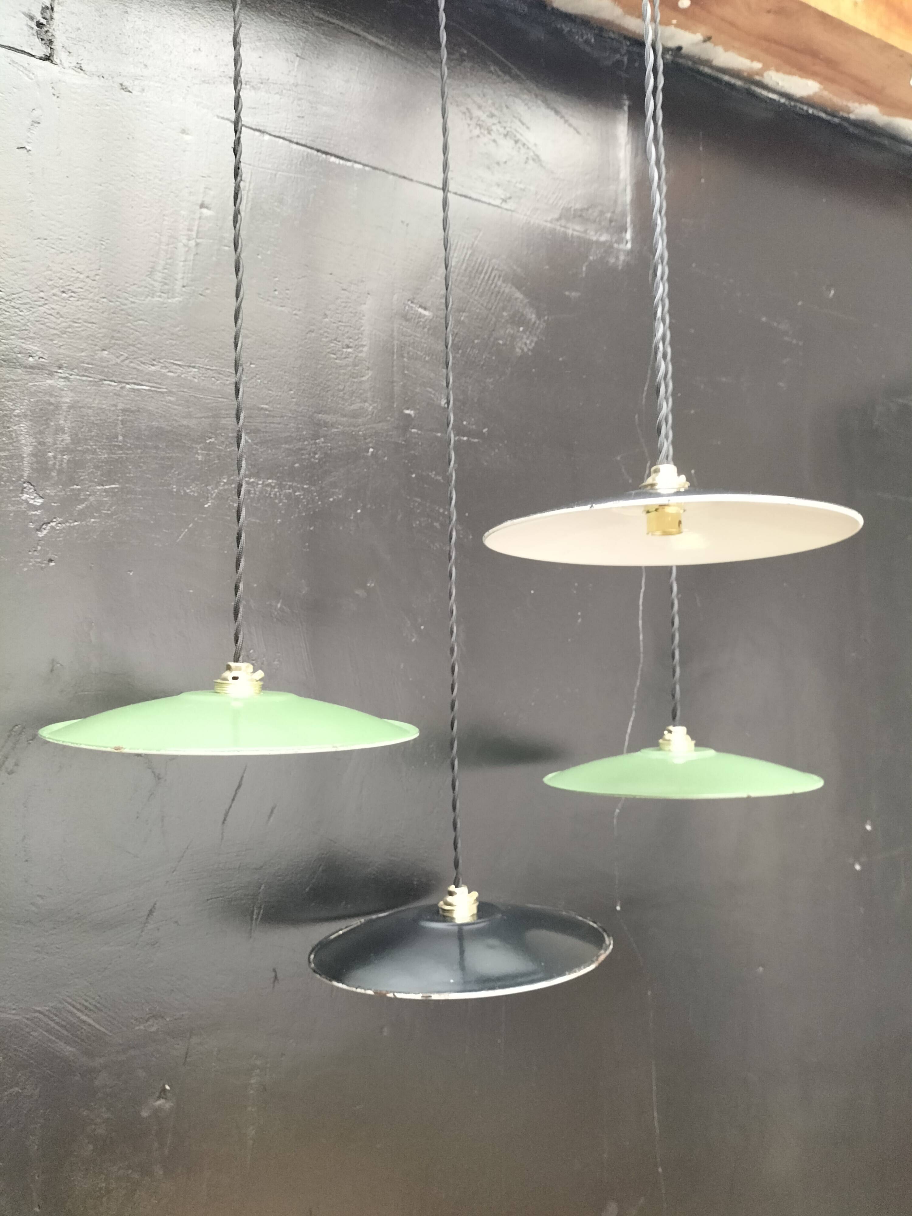 4 enameled sheet metal pendants