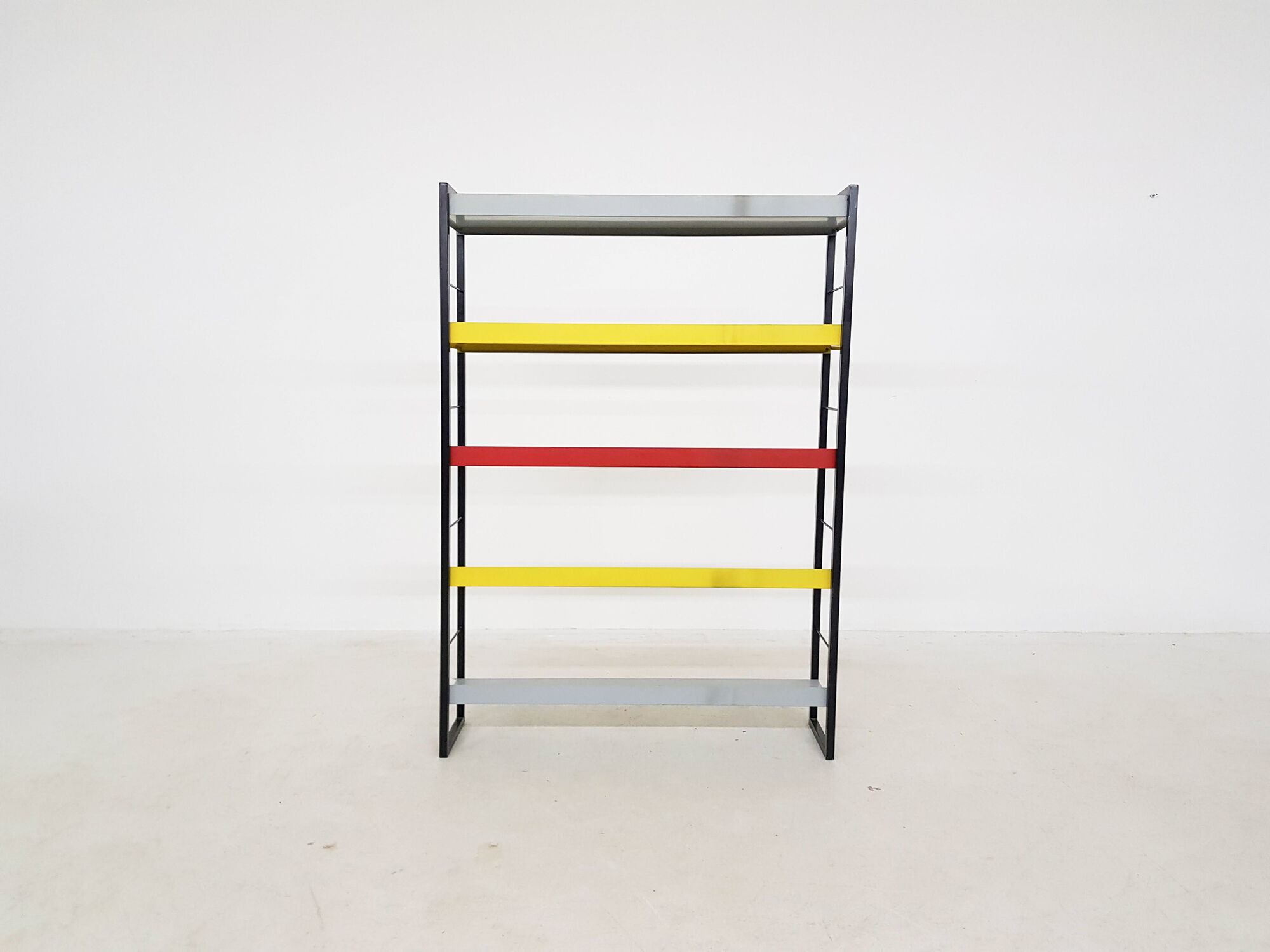 A. D. Dekker for Tomado free standing metal book shelves, The Netherlands 1950's