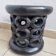Bamiléké black stool in carved wood with rings – 33 × 35 cm