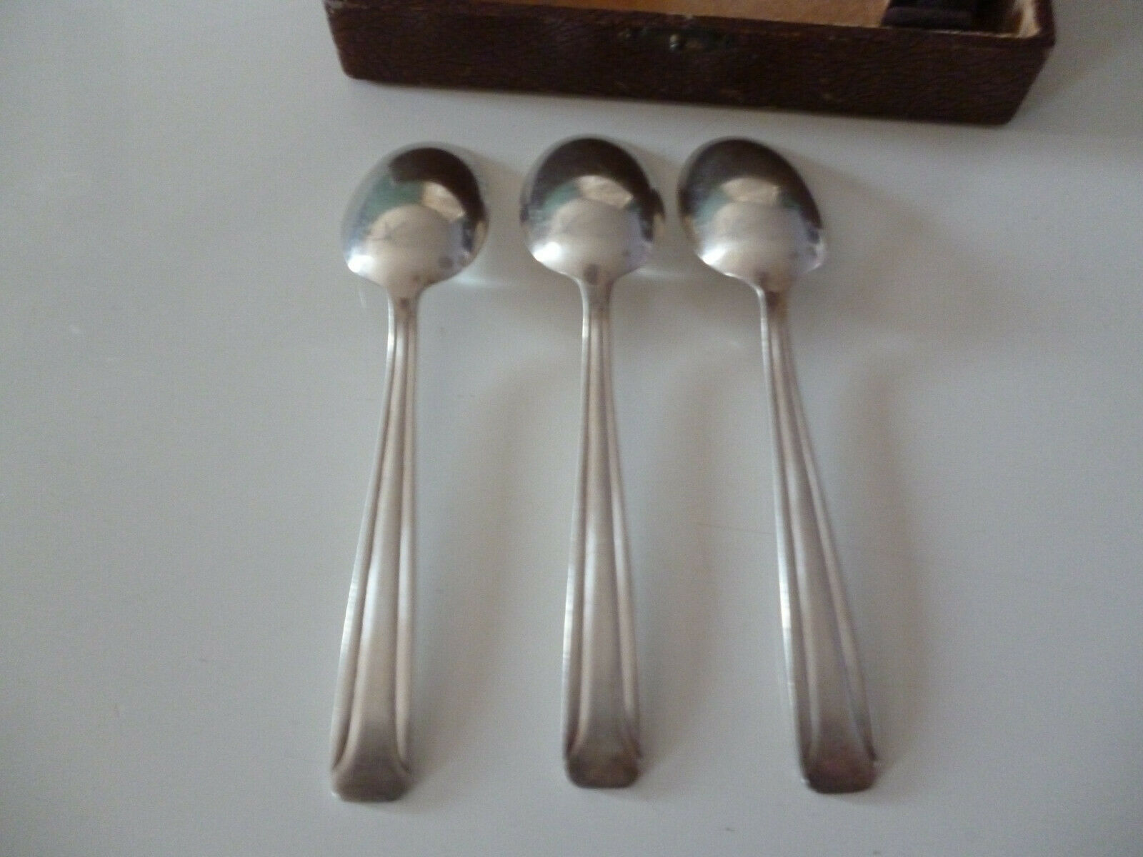 Lot 12 small silver metal cuillieres art deco