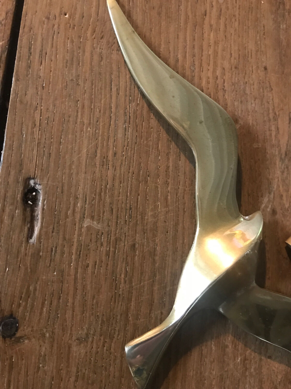 Pair of brass swallows