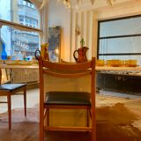 Lot de 4 chaises scandinaves en teck et skaï noir des années 60