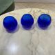 Set of 3 blue glass candle holders