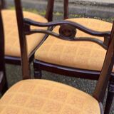 6 dining chairs made of solid mahogany in Regency style with yellow fabric.