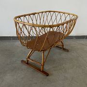 Vintage rattan and wicker cradle on legs, 1970s, Europe