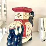 Blue and red ceramic elephant plant stand