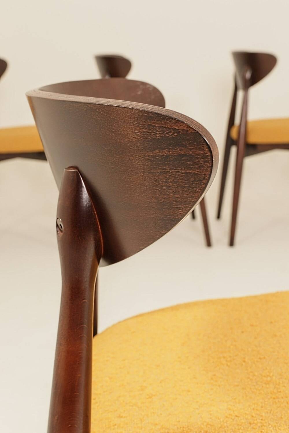 Scandinavian design mustard boucle dining chairs