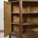 Buffet ou armoire d'angle, à 3 faces, en bois massif, sculpté et peint.