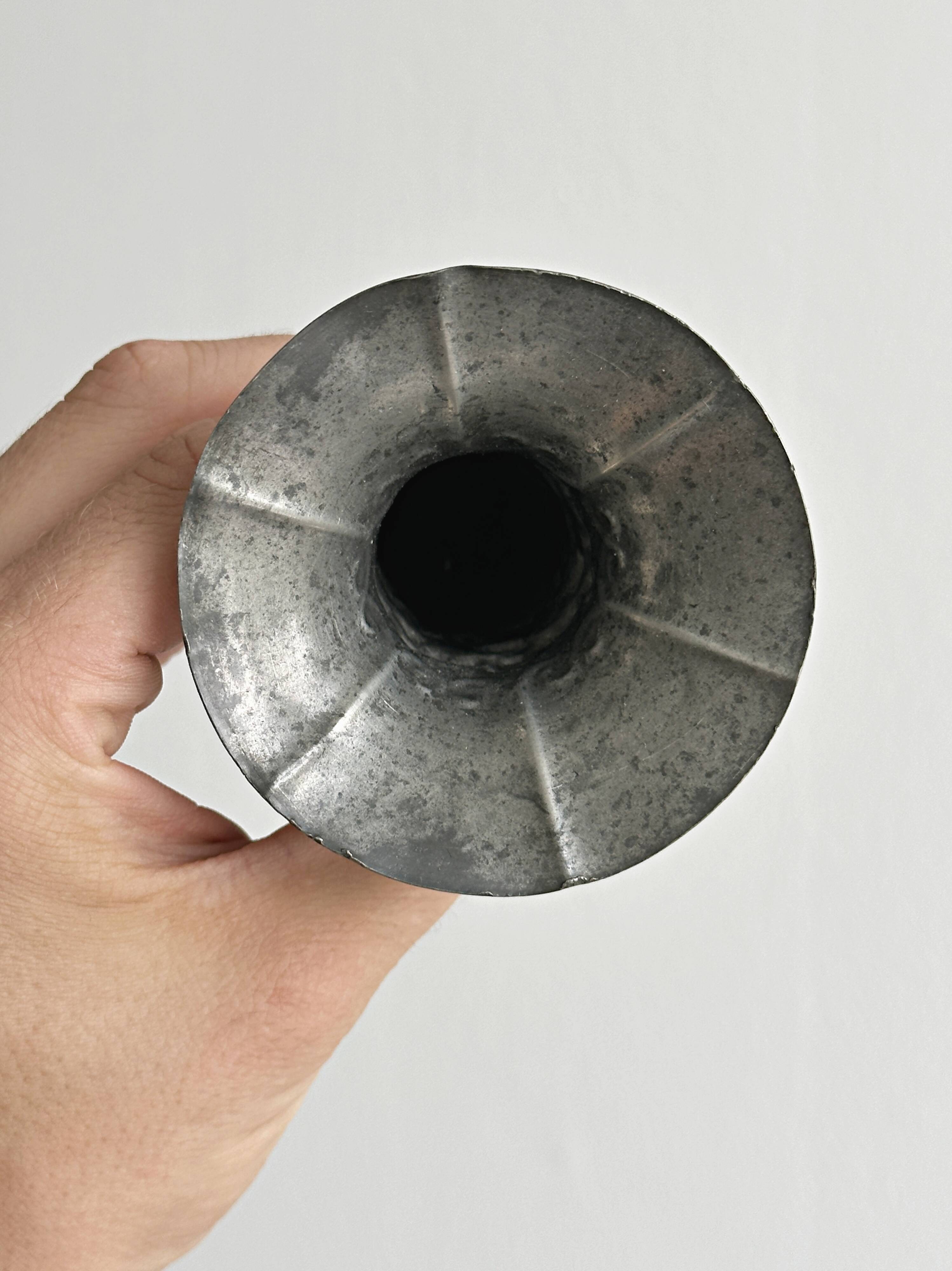 Patinated metal vase
