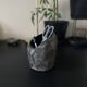 Asymmetrical sculpted concrete vase