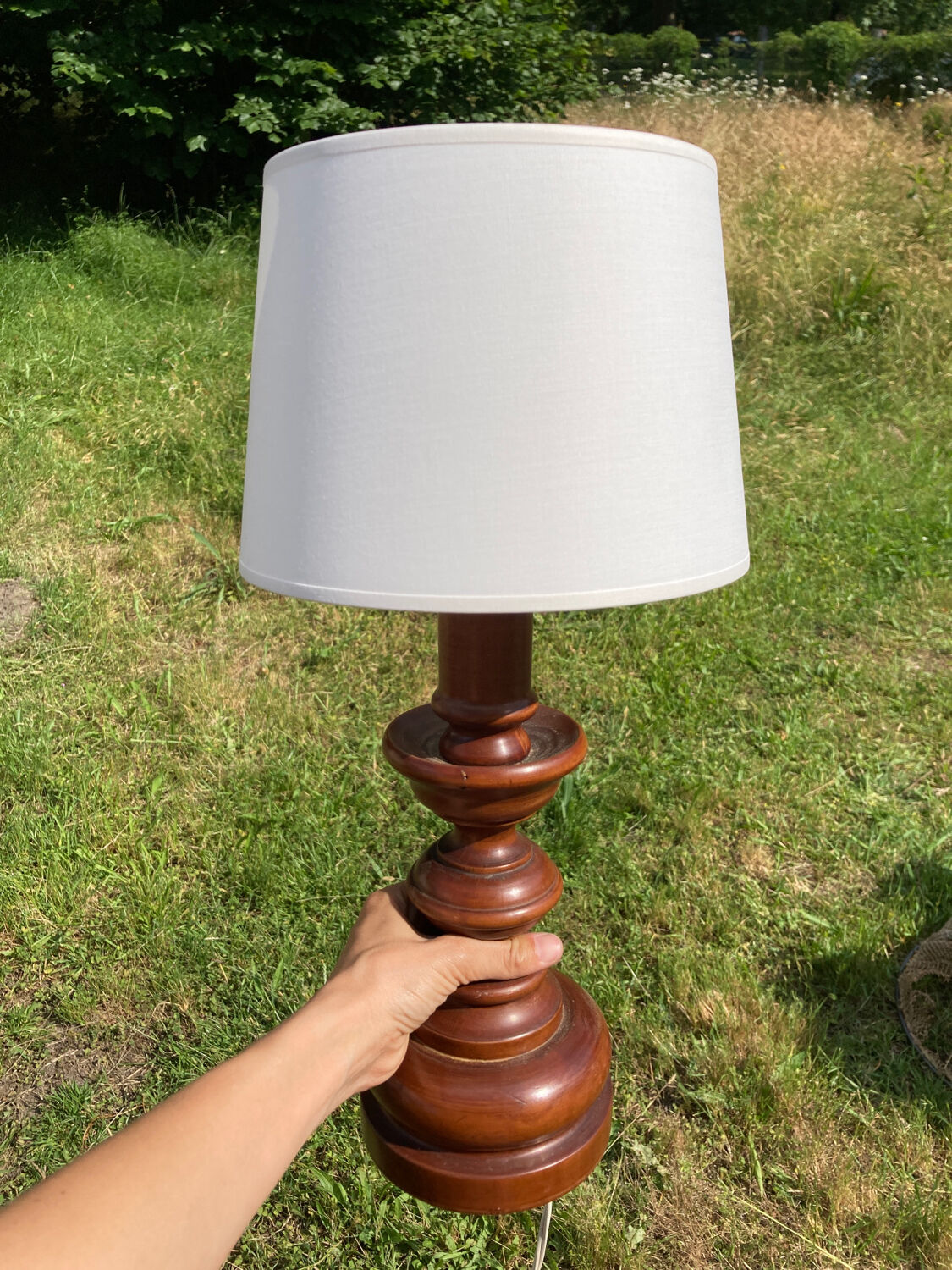 Vintage turned wooden lamp and white lampshade